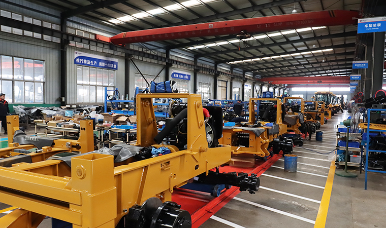 Loader manufacturing workshop with machinery production line